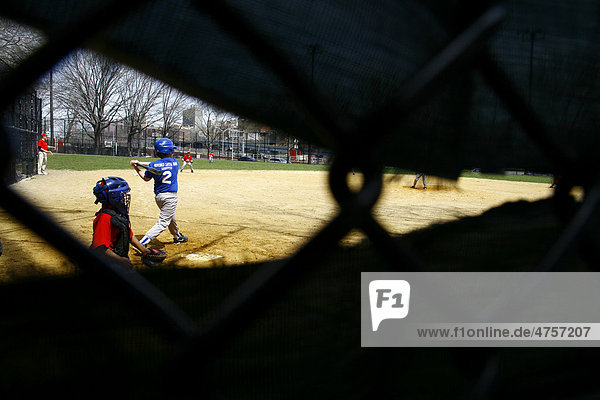 Children playing baseball  Queens  New York  USA