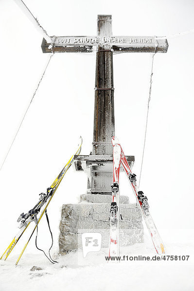 Summit cross with skis  covered in hoar frost  Egg  Bregenzerwald  Vorarlberg  Austria  Europe