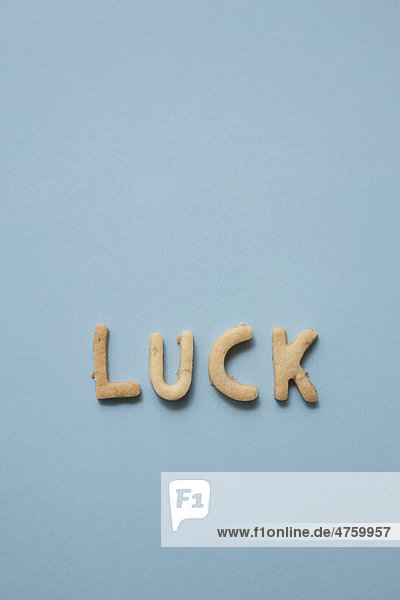 Luck  Schriftzug aus Keksen