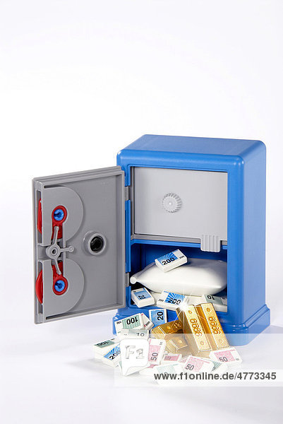 Money and gold in a toy safe  symbolic image