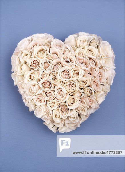Heart of roses  white  cream-coloured wedding bouquet