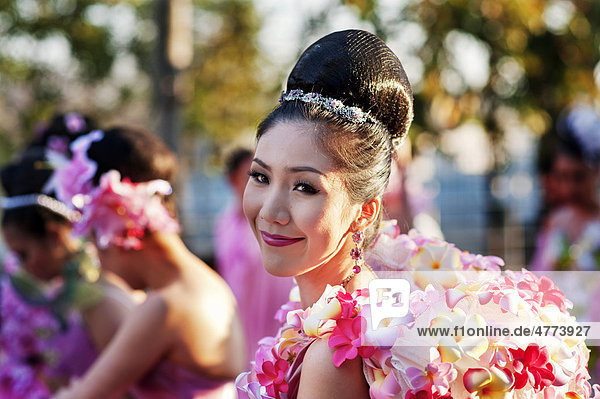 Young woman at the flower parade  Chiang Mai  Thailand  Asia