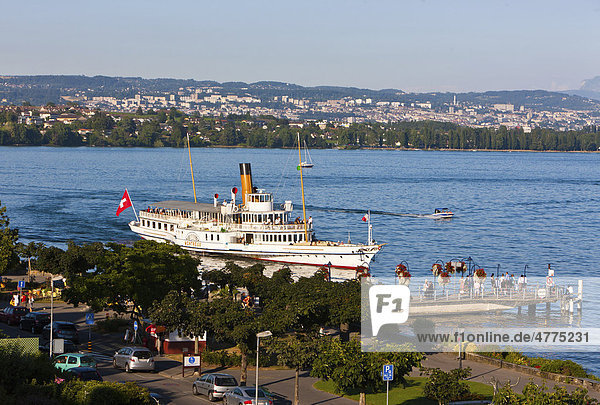 An old paddle-steamer as a ferry for tourists approaching a dock near Morges  canton of Vaud  Switzerland  Europe