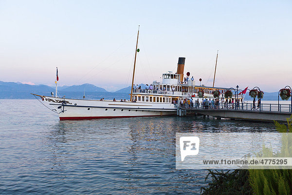 Old paddle-steamer as a ferry for tourists  docked at a wharf near Morges  Canton of Vaud  Lake Geneva  Switzerland  Europe