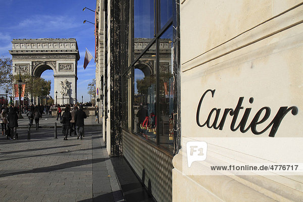 Reflection of the Arc de Triomphe  Triumphal Arch  in the window of a Cartier store on the Champs Elysees  Paris  France  Europe