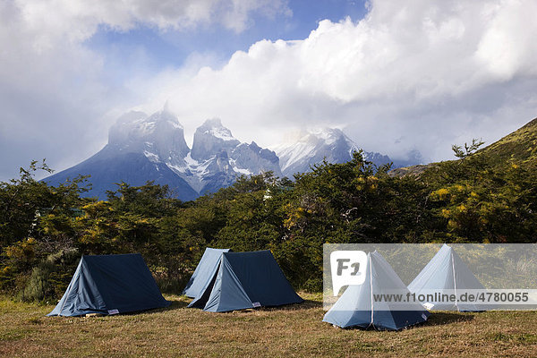 Tents  camping  Mt Cuernos del Paine at back  Torres del Paine National Park  Chile  Patagonia  South America