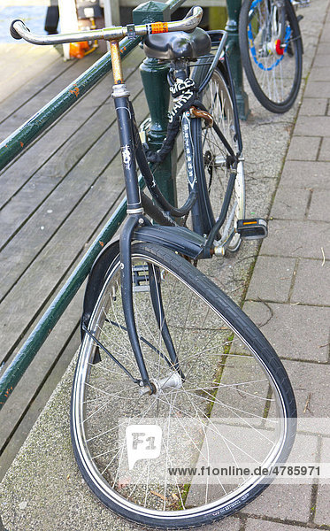 Bicycle with a defective front tire  Amsterdam  Holland  Netherlands  Europe