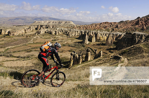 Mountain biker at Cavusim  Goreme Valley  Cappadocia  Turkey  Western Asia