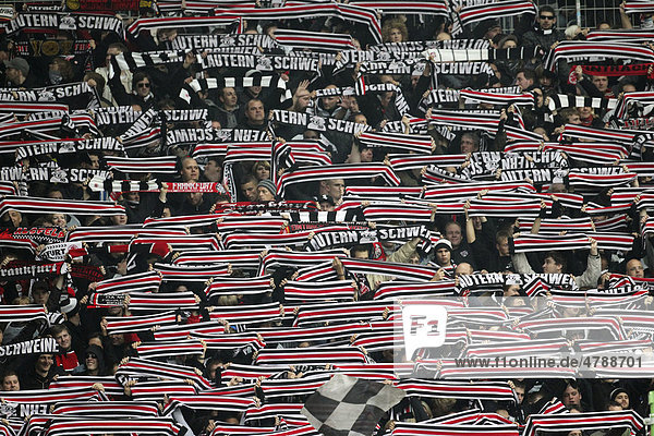 Fans of the Eintracht football club show their fan scarves  Bundesliga football league 8. matchday 1. FC Kaiserslautern - Eintracht Frankfurt football clubs  Fritz-Walter-Stadion  Kaiserslautern  Rhineland-Palatinate  Germany  Europe