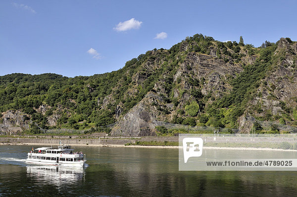 Pleasure boat floating near the Lorelei rock  Upper Middle Rhine Valley UNESCO World Heritage  Sankt Goarshausen  Rhineland-Palatinate  Germany  Europe