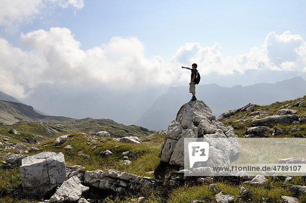 Boy  9  hiking on Nebelhorn Mountain  Allgaeu Alps  Bavaria  Germany  Europe