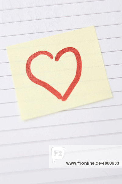 Sticky note with a love note  heart
