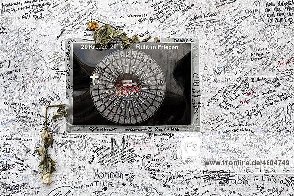 Poster with sympathetic notes and signatures to remember the victims of the crowd crush at the Loveparade 2010 Duisburg North Rhine-Westphalia Germany Europe