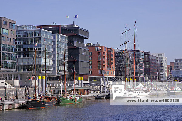 Sailing ships and modern buildings  Tall Ship Harbour on Sandtorkai  HafenCity  Hamburg  Germany  Europe