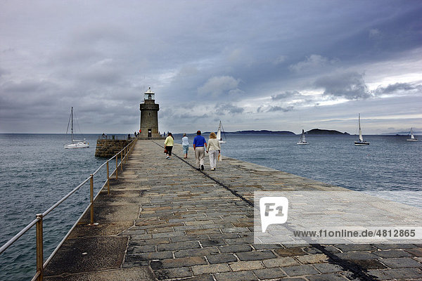 Pier with lighthouse at Castle Cornet  port fortress  entrance to the port of St. Peter Port  Guernsey  Channel Islands  Europe