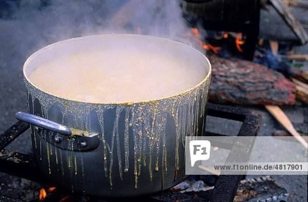 Polenta cooking on a stove on Mardi Gras  Belvedere  French Alps  France
