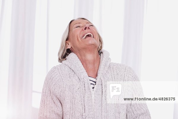 Senior woman laughing