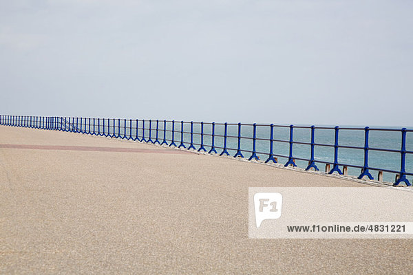 Blue railings and promenade