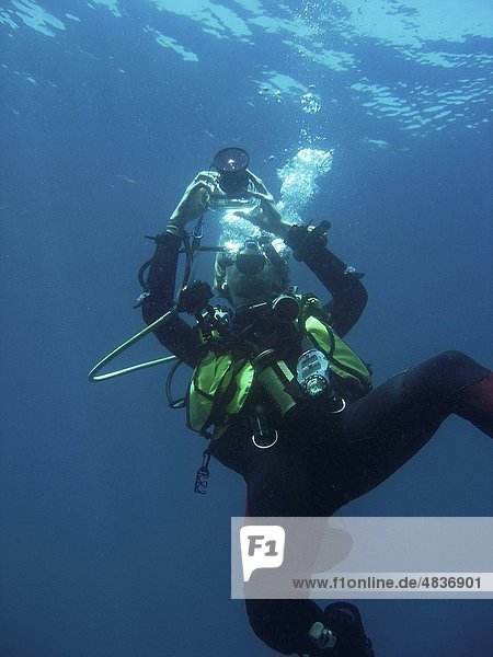 Diver taking a photo Sabang Philippines Taken 2007