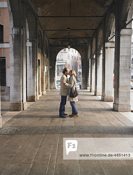 Couple kissing in venice  Italy