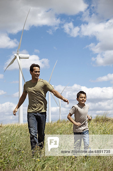 Father and son on a wind farm
