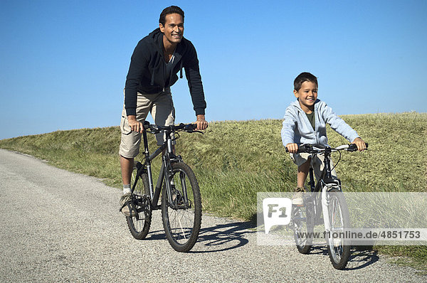 Father and son cycling