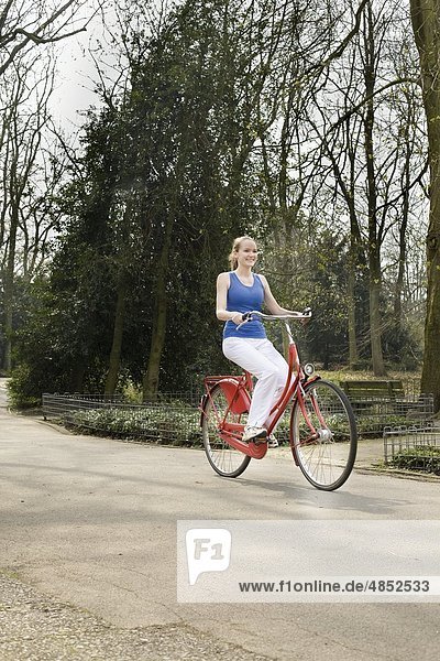 Young woman on bicycle