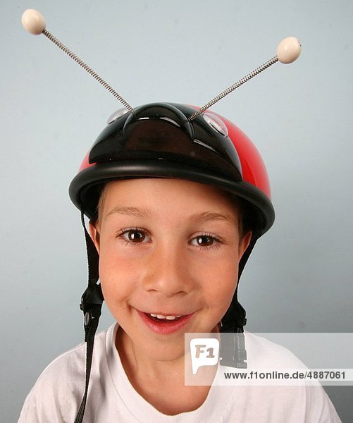 boy with a bicycle helmet