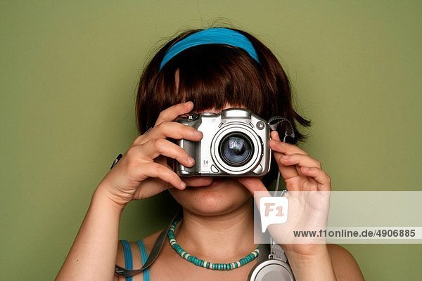 Photographer isolated on green