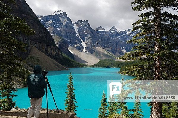 Photographer waiting for light on Moraine lake