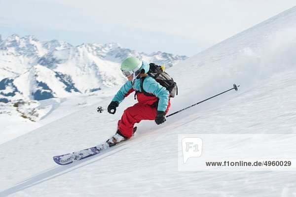 Austria  Kleinwalsertal  Woman skiing