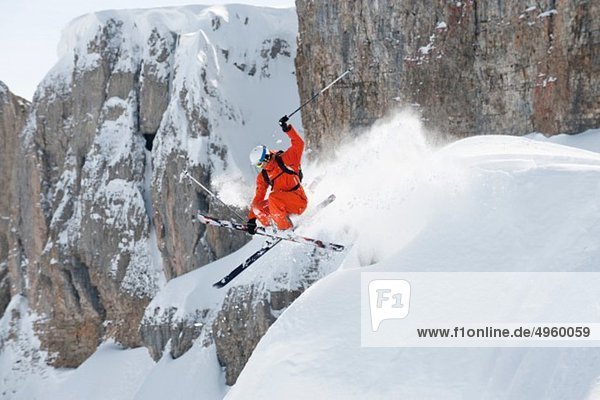 Austria  Kleinwalsertal  Man jumping on ski