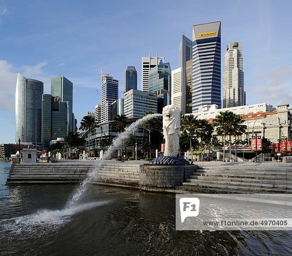 Singapore skyline and Merlion statue in the morning  viewed from Merlion Park  Singapore