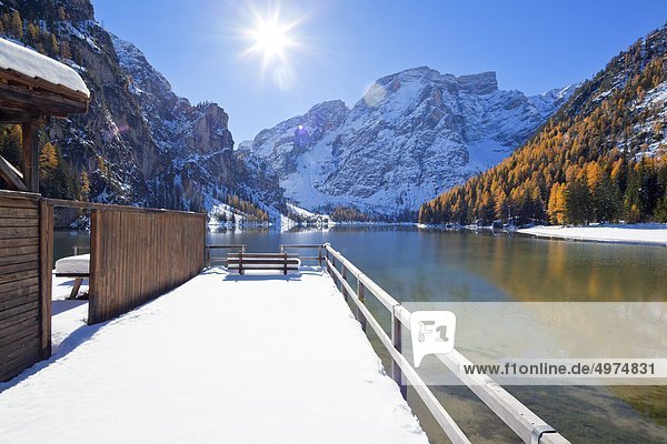 Snowy open-air bath at Lago di Braies in winter South Tyrol Italy