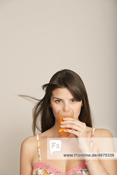 Young Woman drinking juice