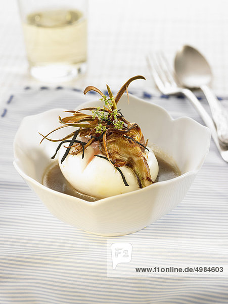 Soft-boiled egg with truffles and ceps