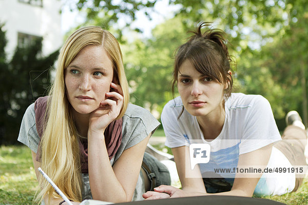 Two female students at campus  Darmstadt  Hesse  Germany