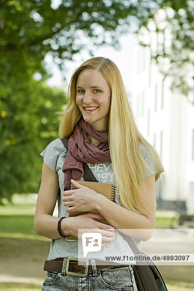 Female student at canpus  Darmstadt  Hesse  Germany