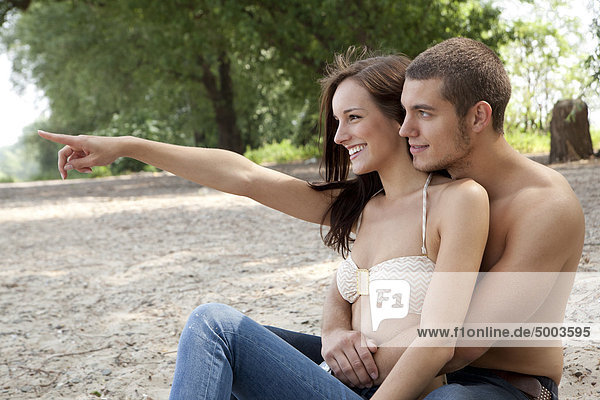 Happy young couple outdoors