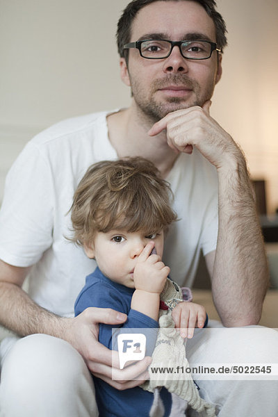 Father and toddler son  portrait