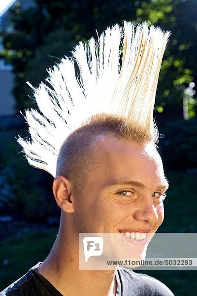 14 Year Old Teenage Boy With Bleached Hair And A Spiked