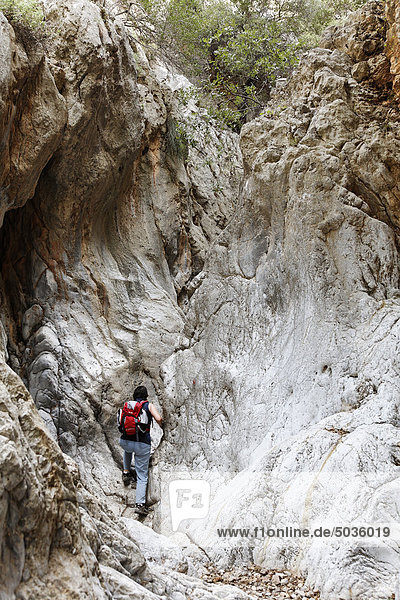 Greece  Crete  Kritsas Gorge  Mature woman hiking near gorge
