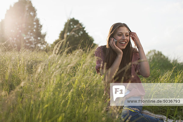 Teenage girl using mobile phone