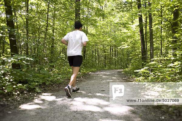 Man running on Humber Trail  Toronto  Ontario  Canada