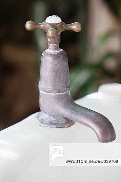 Close-up of a brass faucet
