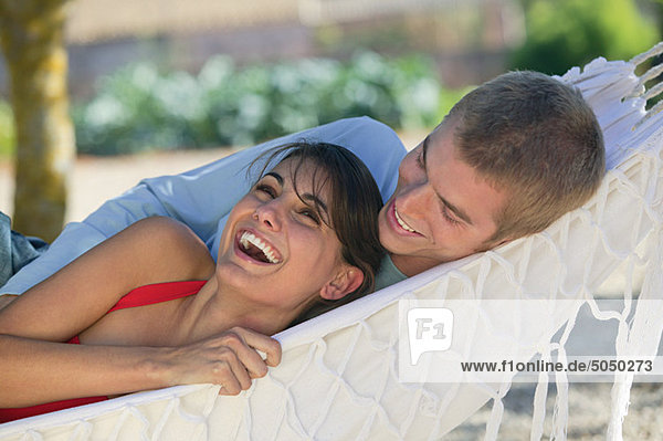 Happy couple in a hammock