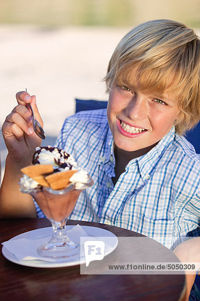Boy with an ice cream sundae