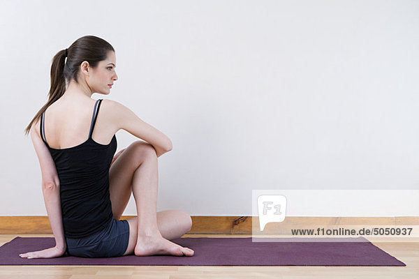 Woman stretching during yoga