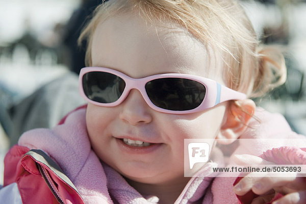 Toddler girl wearing sunglasses  portrait