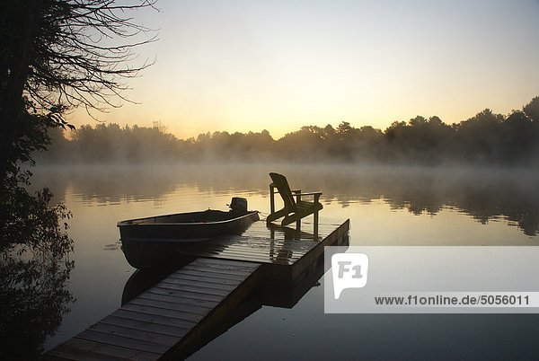 Muskoka Chair and small boat  Ontario